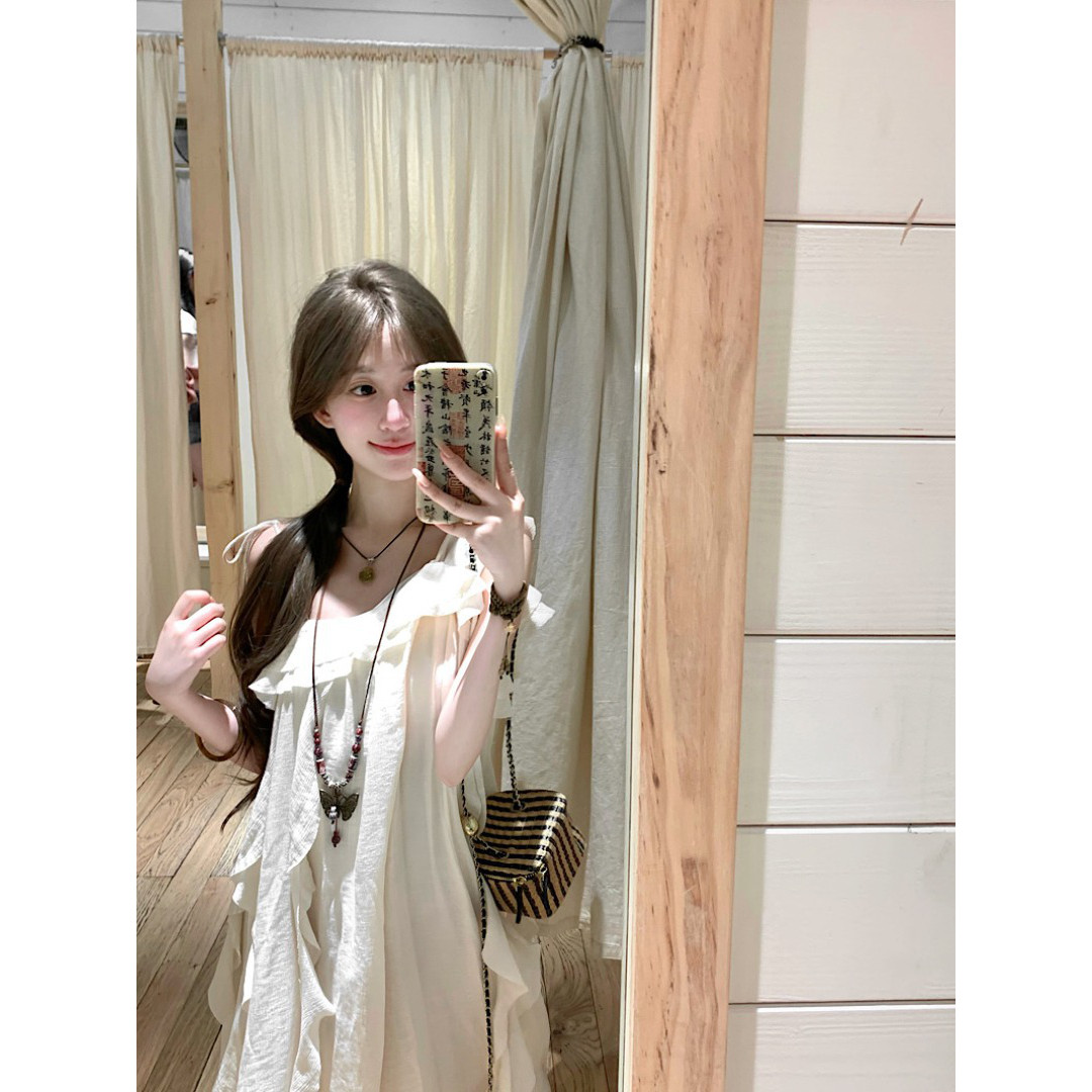 荷叶边斜肩吊带连衣裙女夏季温柔风海边度假长裙露肩宽松a字裙子