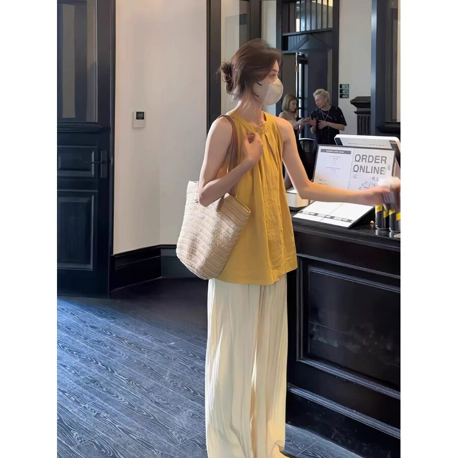 黄色挂脖吊带小背心女夏款2024新款外穿设计感小众娃娃衫无袖上衣