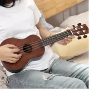 Ai Keli dây đàn guitar nhỏ của toàn bộ ngựa Hawaii nhạc cụ bé bài hát đồ chơi màu đen gió gỗ guitar - Nhạc cụ phương Tây