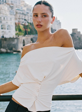 q25tp450欧美风女装秋冬新款纯色荡领无袖纽扣修身上衣