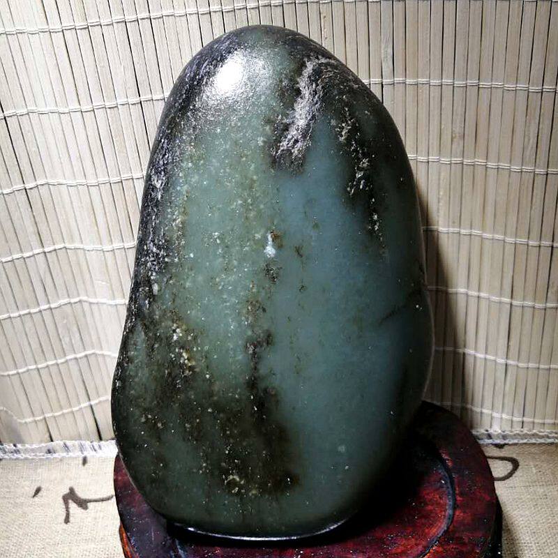 青玉籽大块独籽手把件