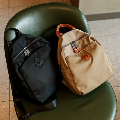 双肩包女防水休闲通勤背包2025春新款大容量上班背包牛津布轻便包