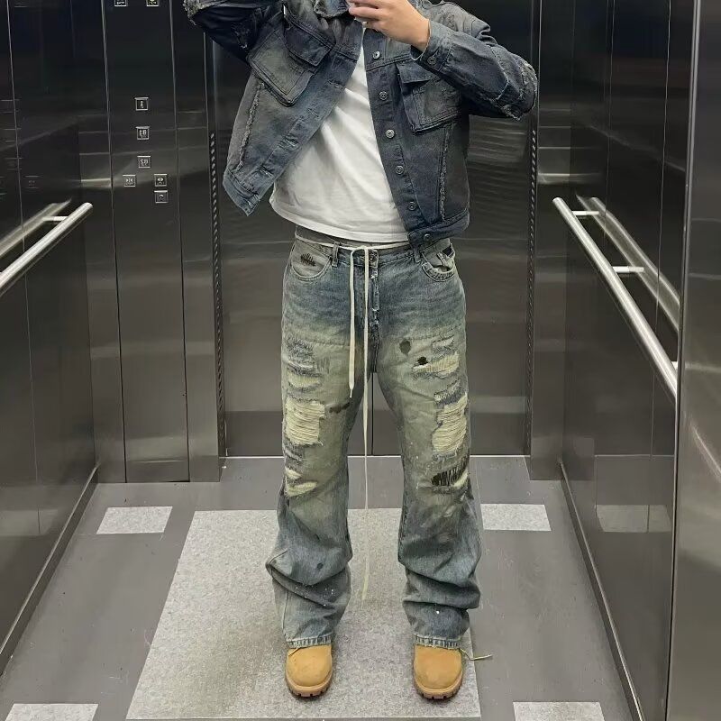 美式做旧脏洗破洞牛仔裤男高街痞帅设计感刀割贴布泼墨微喇长裤潮