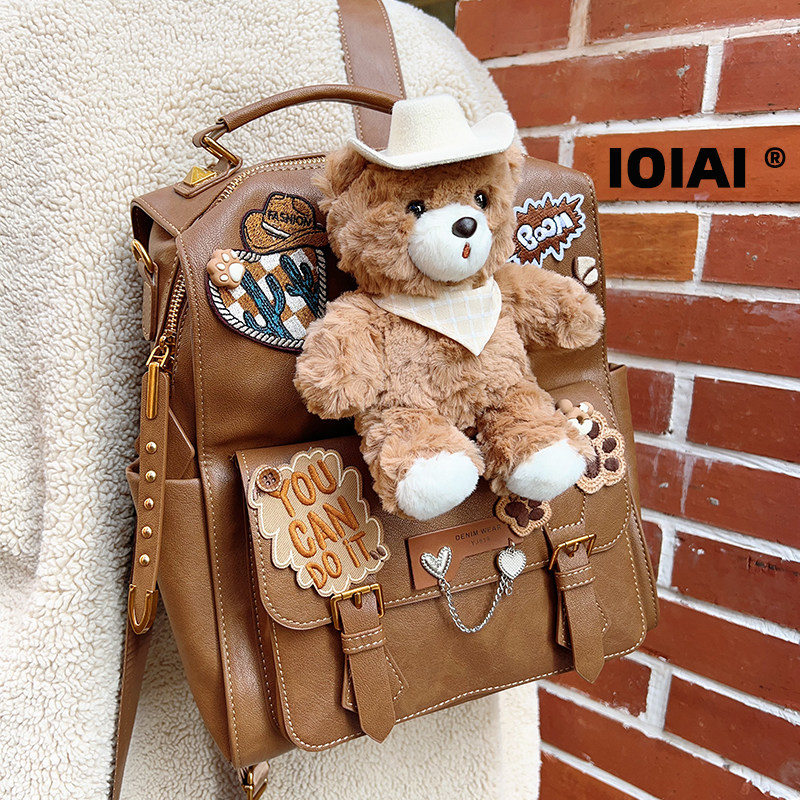 IOIAI西部熊仔双肩包高级感小众背包女大学生书包大容量可爱礼物