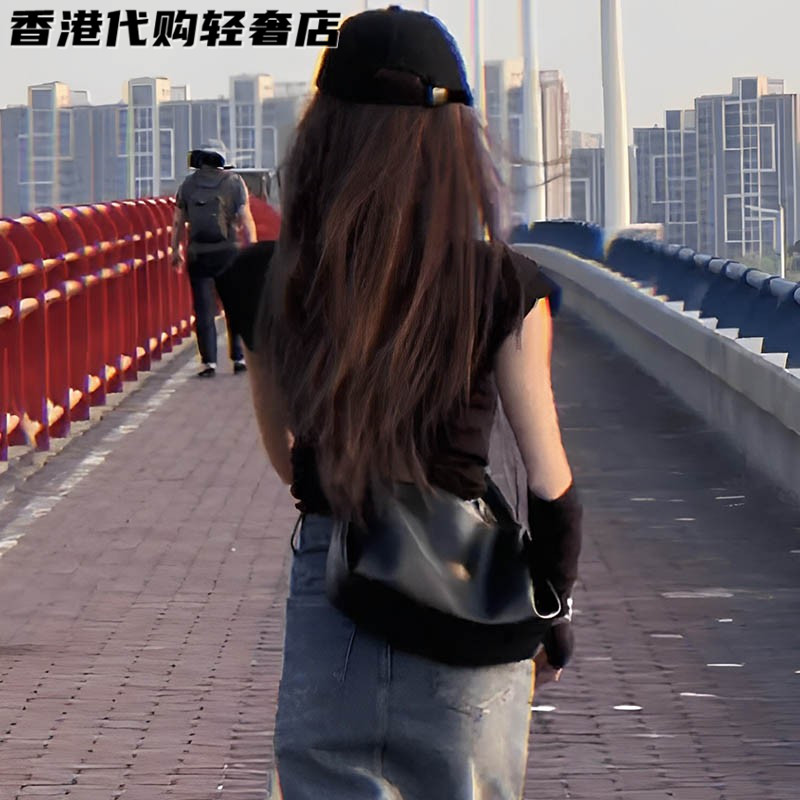 法国ZAMP高级感时尚真皮饺子包女2026新款斜挎包小众质感枕头包