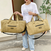 大容量手提旅行包男帆布背包出差旅游包装 衣服大包单肩户外行李包