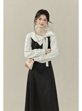 法式赫本设计感黑色连衣裙女秋季气质显瘦新款长袖蝴蝶结收腰长裙