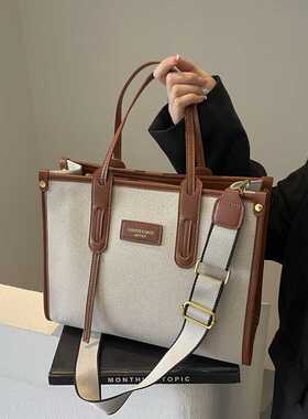 通勤大容量帆布包包女2026新款流行爆款百搭斜挎包时尚手提托特包