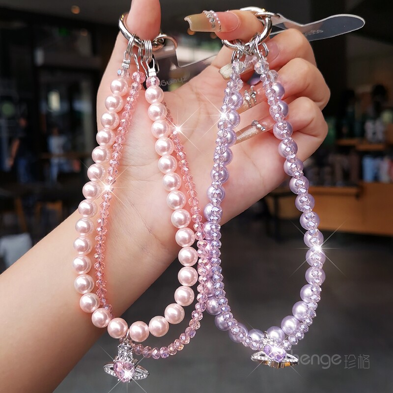 双层珍珠手机链闪亮水晶串珠短款星球吊坠精致轻奢风女生防脱手挂饰出行旅游逛街适配手机壳多色可选手机挂绳