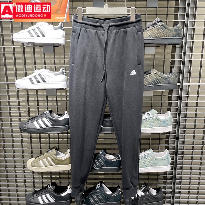 阿迪达斯女裤2025冬季款舒适针织运动休闲锥形收口小脚长裤IS4941