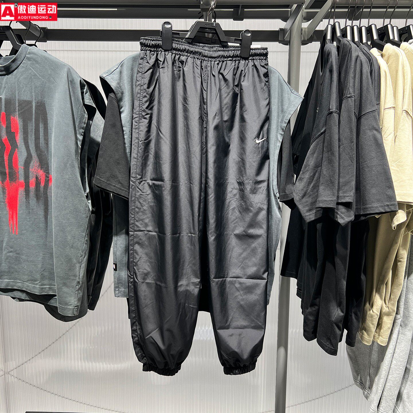 Nike耐克女装2026秋简约梭织速干宽松运动休闲束脚长裤IM8164-010