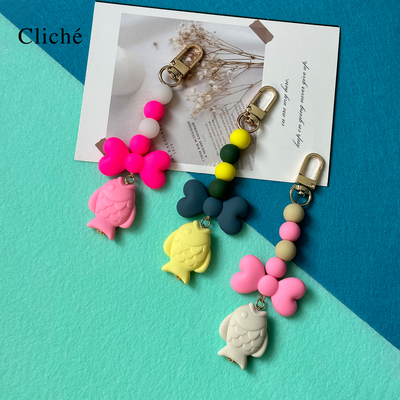 CLICHE蝴蝶结鱼仔硅胶手机小挂饰