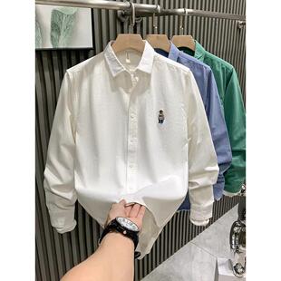 今年流行的清新刺绣长袖衬衫男士春秋新款韩版百搭青年翻领上衣男