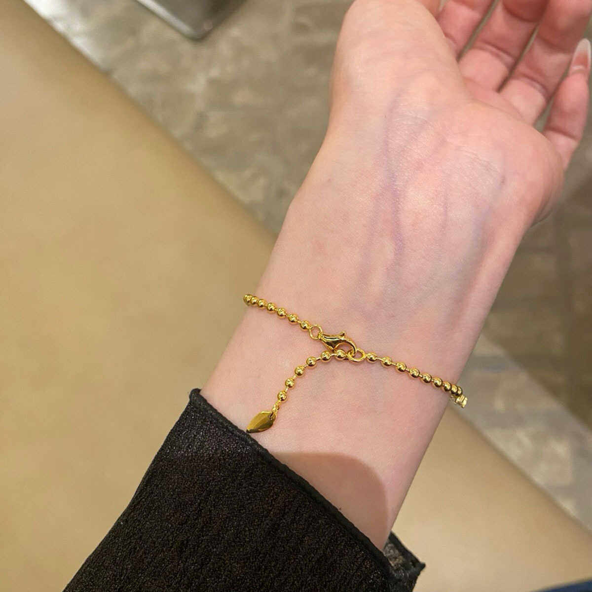 流苏手链圆珠间钻金色