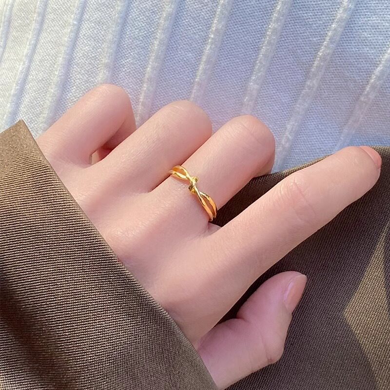 999足金扭结黄金戒指女莫比乌斯环戒子24K纯金素圈生日礼物送女友