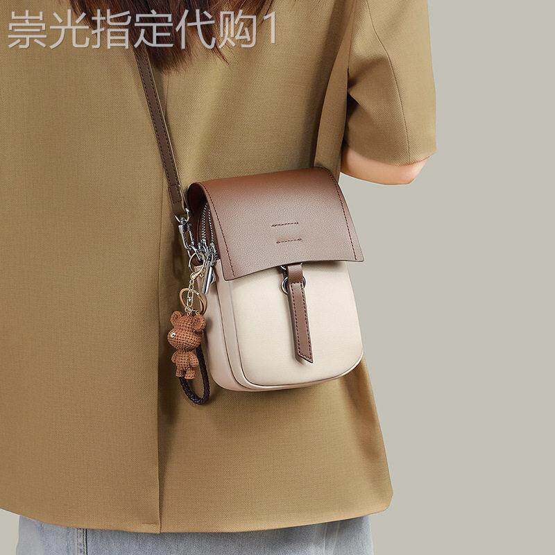 法国正品MK Jessie真皮手机包女2025新款迷你小包包夏轻便斜挎包
