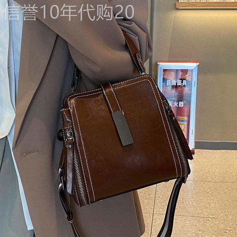 法国正品MK Jessie轻奢牛皮包包女百搭真皮手提水桶包单肩斜挎包