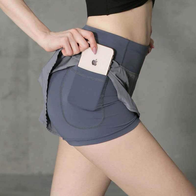 Hidden pocket sports shorts with night light compression