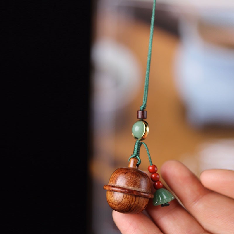 2025花梨木香囊古典镂空香器手机链链创意钥匙扣小叮当挂件扩香储