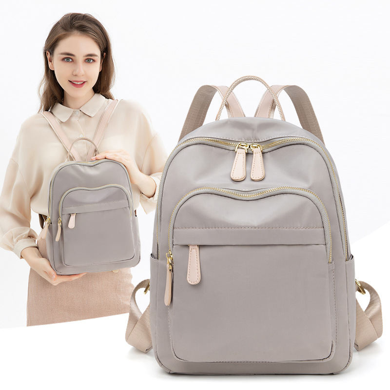 双肩包女2023秋夏上新款百搭简约轻便防水休闲通勤牛津布揹包百搭