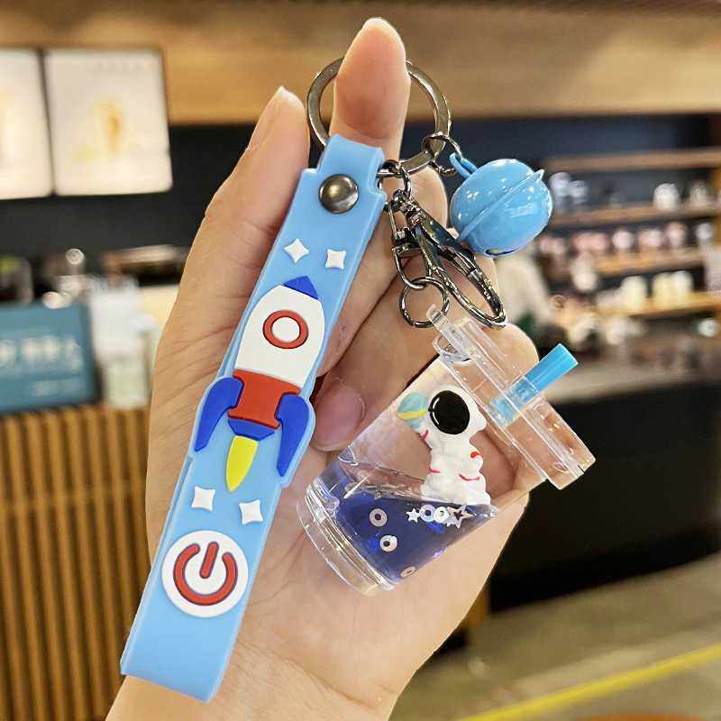 新款直销星球宇航员流沙钥匙扣创意可爱儿童书包挂件汽车钥匙链精,节庆用品/礼品,钥匙扣,淘宝优惠券,粉丝福利购,淘宝优惠卷