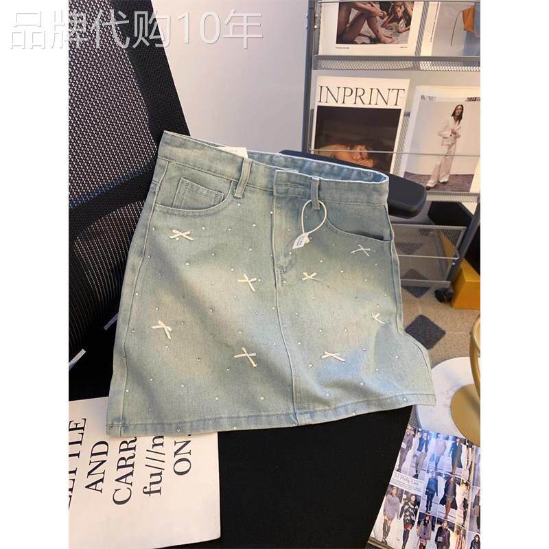 韩版烫钻蝴蝶结牛仔裙女2025夏季新款高腰显瘦a字包臀半身裙短裙