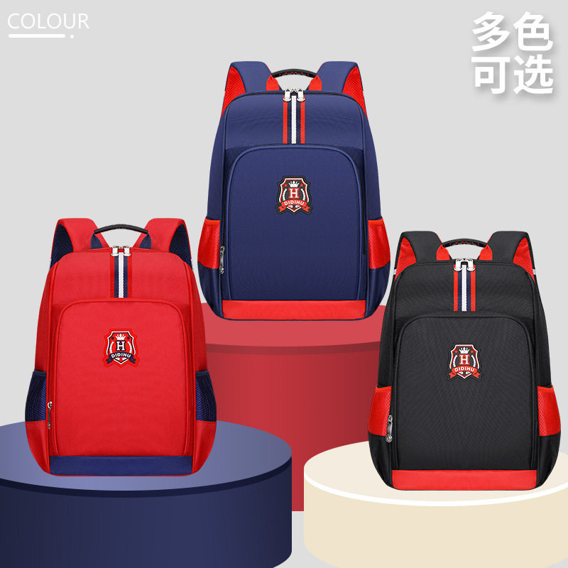 小学生书包轻便大容量印LOGO儿童护脊减负英伦风双肩书包掌柜推荐