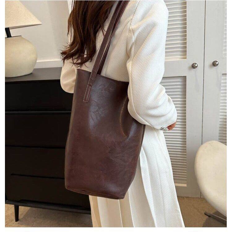 复古欧美风慵懒水桶包高颜值单肩大容量通勤大学生简约时尚托特包