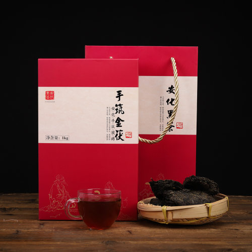 红色礼袋包装湖南黑茶金花黑茶叶茯茶砖黑茶叶手筑茯砖黑茶2017年