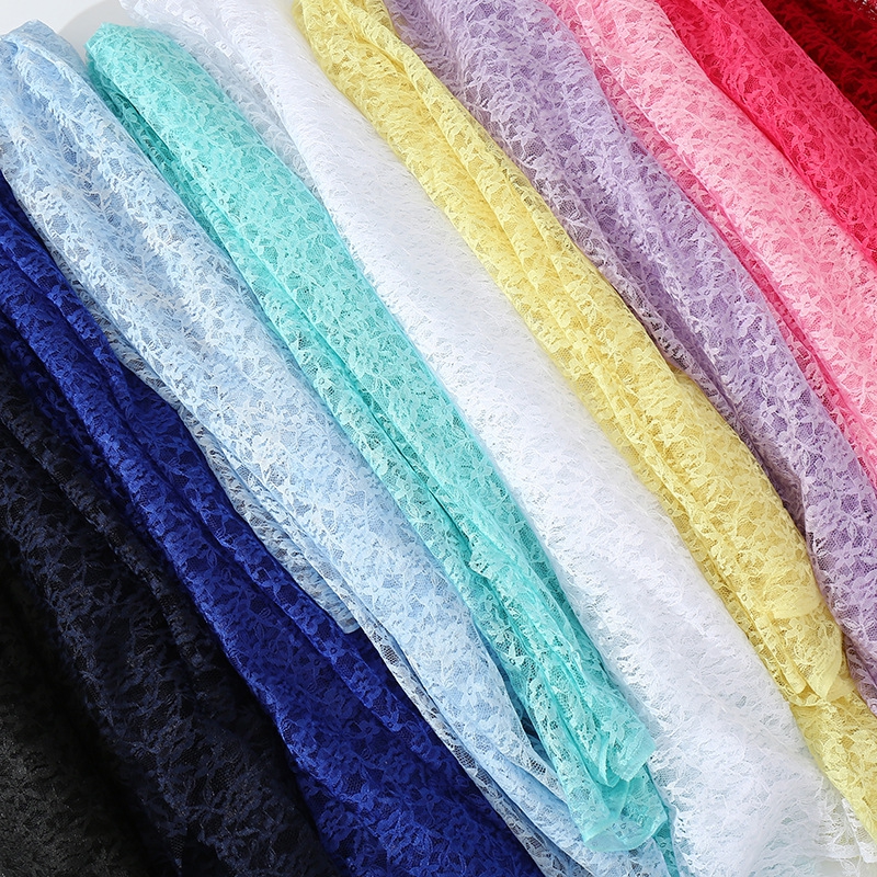 新款直销无弹蕾丝布料花朵镂空网纱短裙服装面料窗帘婚礼背景装饰