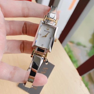 时尚风贝母镶钻间金手表