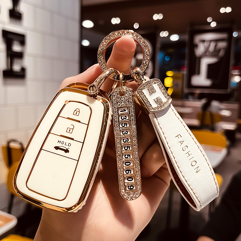 适用丰田新凯美瑞钥匙套卡罗拉亚洲龙高档女包雷凌奕泽C-HR男壳扣