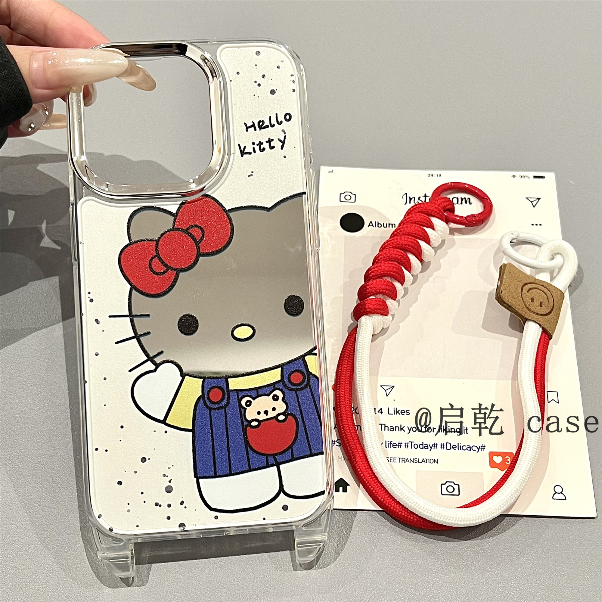启乾 泼墨镜面凯蒂猫腕带iPhone16/15手机壳适用苹果14/13promax硬壳12/11链条挂绳哈喽HelloKitty新款镜子女