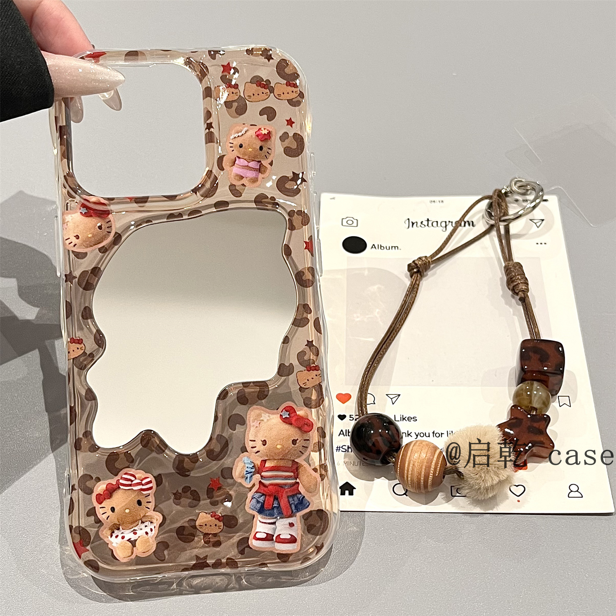 启乾 褶皱镜面豹纹凯蒂猫腕带iPhone16/15手机壳适用苹果14/13promax软壳链条挂绳美拉德哈喽HelloKitty新款
