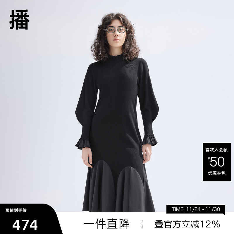 精致木耳边小高领，上宽下窄羊腿袖