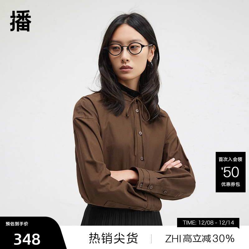 时髦串绳立领，袖口三层压褶设计