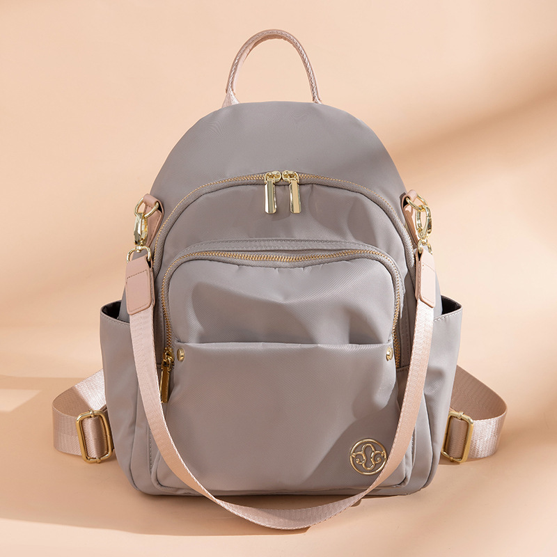 双肩包包女式2025新款百搭牛津布轻便旅行背包大容量学生书包