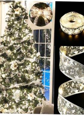 Christmas ribbons lights strung decorate Christmas tree