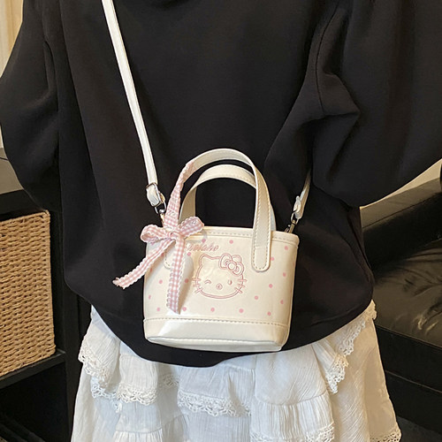卡通KT猫可爱小包包女2026新款洋气波点手提水桶包迷你超火斜挎包
