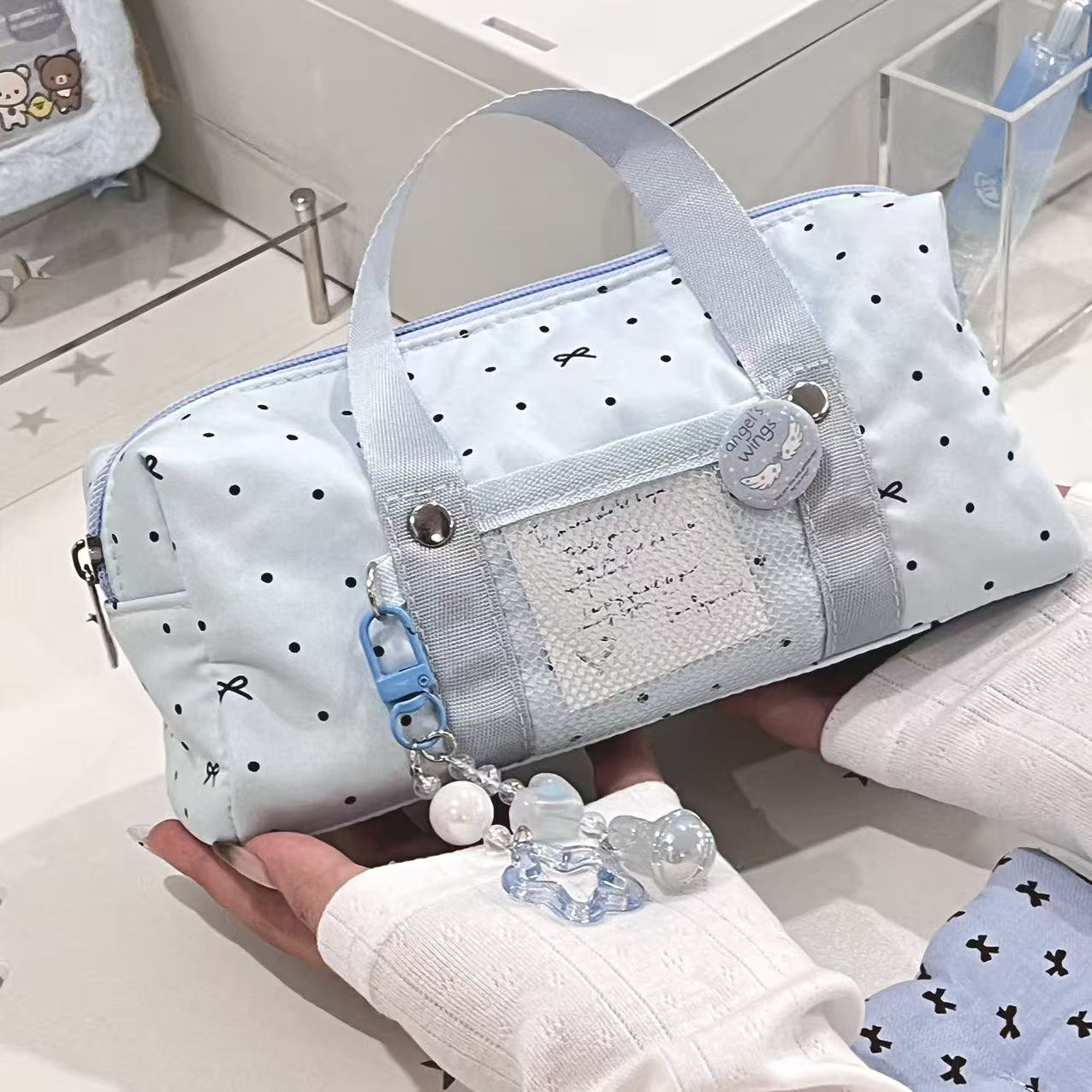 ins风蝴蝶结点点手提痛笔袋