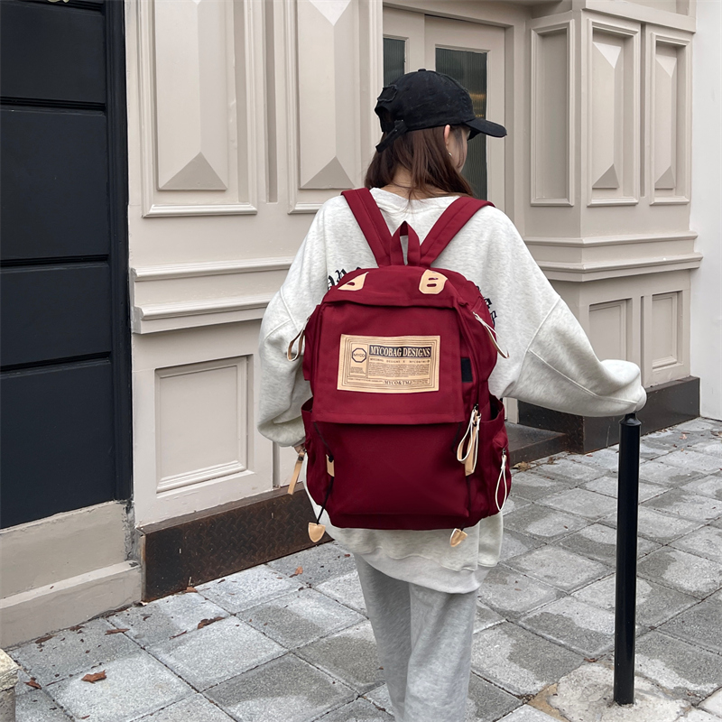 大学生上课通勤书包女高颜值ins风可放电脑16寸红色背包女双肩包