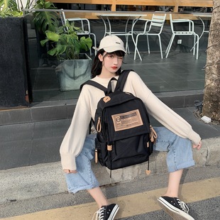 双肩包女夏2025新款高级感书包大学生简约高中生初中女生黑色背包