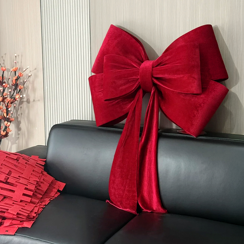 蝴蝶结装饰男女方客厅沙发背景墙