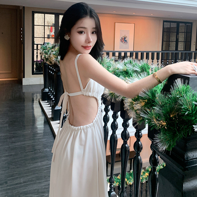 三亚旅游拍照衣服女海边度假沙滩裙超仙白色露背吊带连衣裙仙女裙