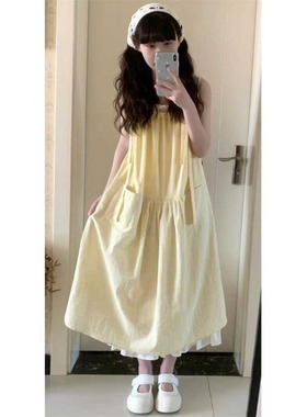 甜美可爱设计感小众百搭黄色格子拼接抽绳口袋显瘦吊带连衣裙女