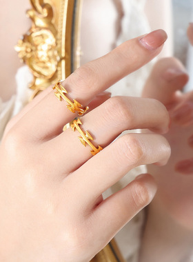 个性蝴蝶结形状素圈环绕圆圈戒指