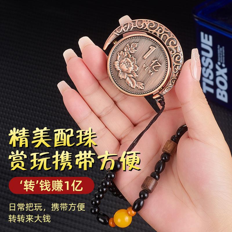 638创意月半一亿摆件旋转解压陀螺大钱金币充气打火机厂家