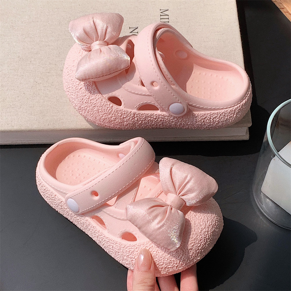 儿童海边度假沙滩凉鞋公主风粉色蝴蝶结女童宝宝夏季两穿洞洞鞋夏