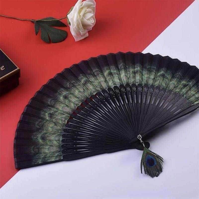 礼品扇羽毛扇子女士竹柄折扇孔雀扇古典真丝扇礼品便携花纹孔雀