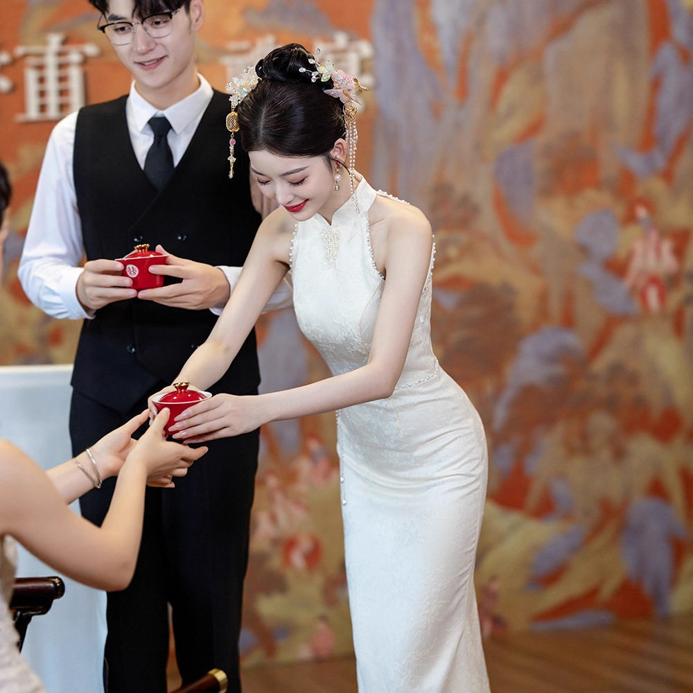 2026新款新中式香槟色订婚旗袍敬酒服新娘鱼尾连衣裙绝美登记领证